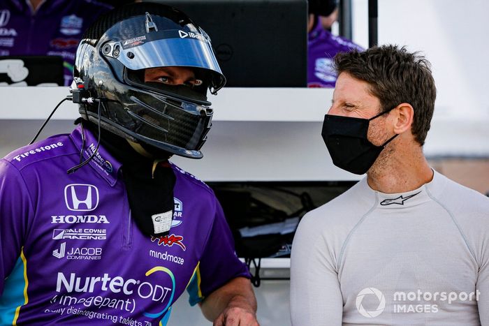 Romain Grosjean, Dale Coyne Racing with Rick Ware Racing Honda con un miembro de su equipo