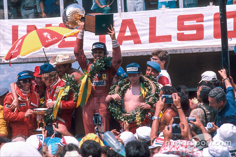 Race winner Carlos Reutemann, Ferrari, second place James Hunt, McLaren Ford and third place Niki La