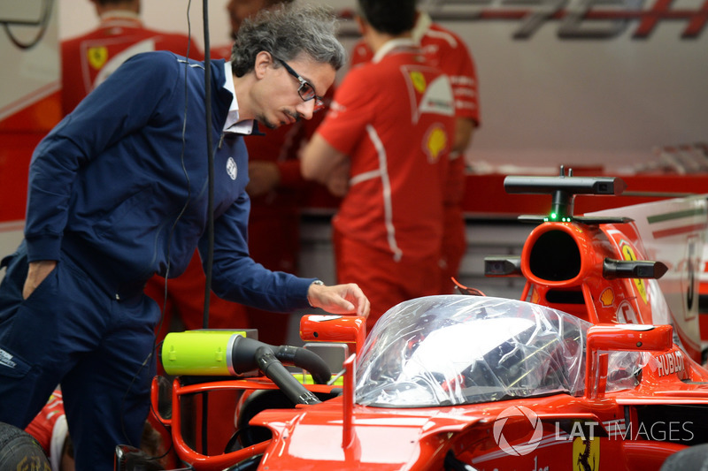 Laurent Mekies, FIA Safety Director looks at Ferrari SF70-H with cockpit shield