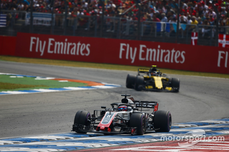 Romain Grosjean, Haas F1 Team VF-18, Carlos Sainz Jr., Renault Sport F1 Team R.S. 18