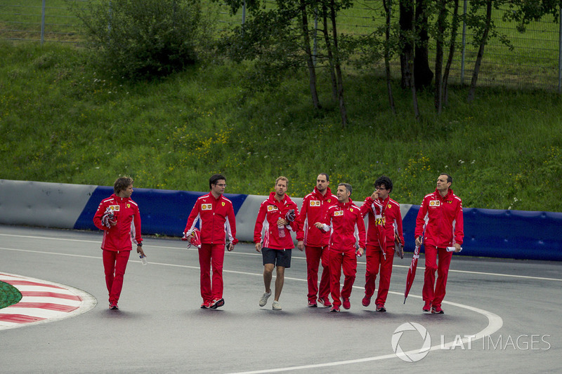 Sebastian Vettel, Ferrari walks the track with the team