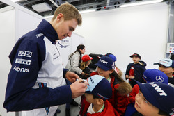 Sergey Sirotkin, Williams Racing, signs autographs for kids