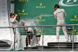 The podium (L to R): Nico Rosberg, Mercedes AMG F1 celebrates with Victoria Vowles, Mercedes AMG F1 Partner Services Director and race winner Lewis Hamilton, Mercedes AMG F1