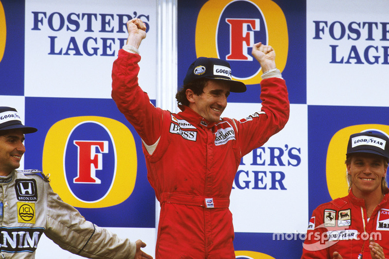 Podium: racewinnaar Alain Prost, McLaren TAG Porsche, tweede plaats Nelson Piquet, Williams Honda, d