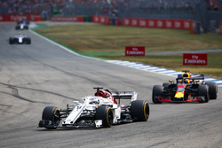 Marcus Ericsson, Sauber C37, leads Daniel Ricciardo, Red Bull Racing RB14