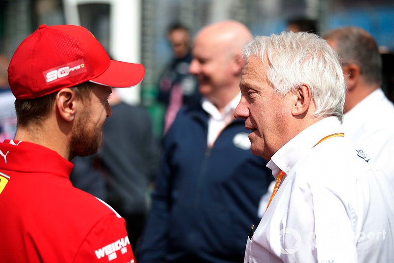 Sebastian Vettel, Ferrari, with Charlie Whiting, Race Director, FIA