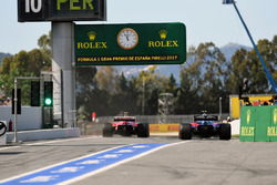 Карлос Сайнс, Scuderia Toro Rosso STR12 та Кімі Райкконен, Ferrari SF70H