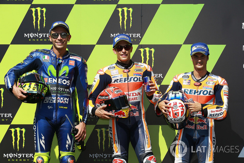 Polesitter Marc Marquez, Repsol Honda Team, second place Valentino Rossi, Yamaha Factory Racing, thi