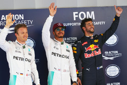 Qualifying top three in parc ferme,: Nico Rosberg, Mercedes AMG F1, second; Lewis Hamilton, Mercedes
