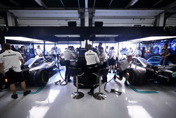 The engineers at work in the Mercedes garage
