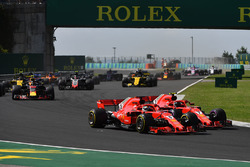 Sebastian Vettel, Ferrari SF71H and Kimi Raikkonen, Ferrari SF71H battle