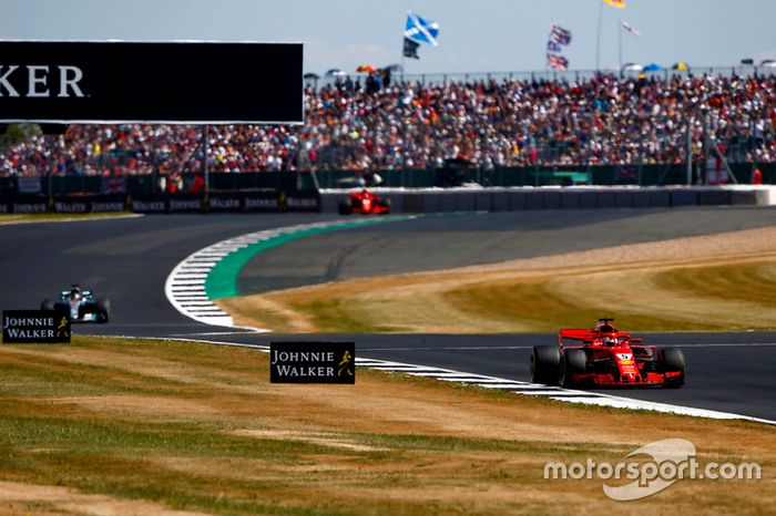 Sebastian Vettel, Ferrari SF71H, y Lewis Hamilton, Mercedes AMG F1 W09