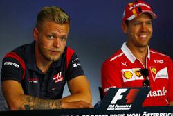 Kevin Magnussen, Haas F1 Team, Sebastian Vettel, Ferrari