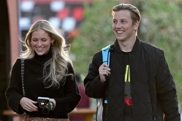 Liam Lawson, RB F1 Team with his girlfriend Hannah St. John