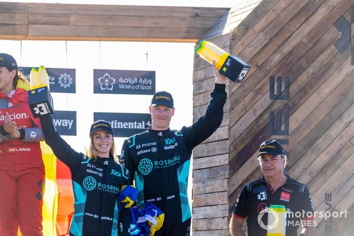 Mikaela Ahlin-Kottulinsky, Rosberg X Racing, and Johan Kristoffersson, Rosberg X Racing, 3rd position, with their trophies on the podium