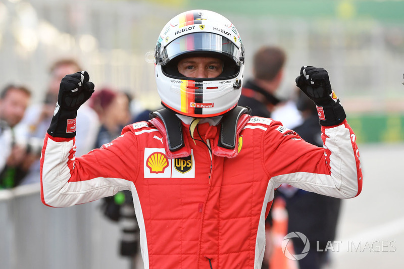 Pole sitter Sebastian Vettel, Ferrari celebrates in parc ferme