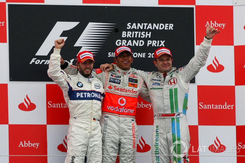 Podium: second place Nick Heidfeld, BMW Sauber F1, Race winner Lewis Hamilton, McLaren, third place Rubens Barrichello, Honda Racing F1 Team 