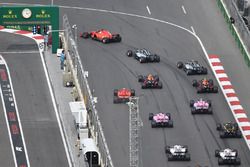 Sebastian Vettel, Ferrari SF71H leads at the start of the race