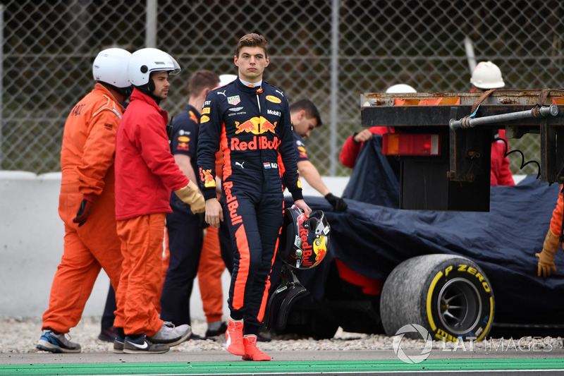 Max Verstappen, Red Bull Racing walks in after spinning into the gravel