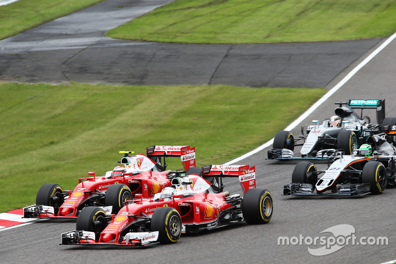 Sebastian Vettel, Ferrari SF16-H and team mate Kimi Raikkonen, Ferrari SF16-H battle for position