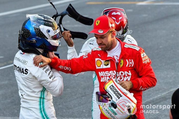 Ganador de la pole Valtteri Bottas y Sebastian Vettel, Ferrari