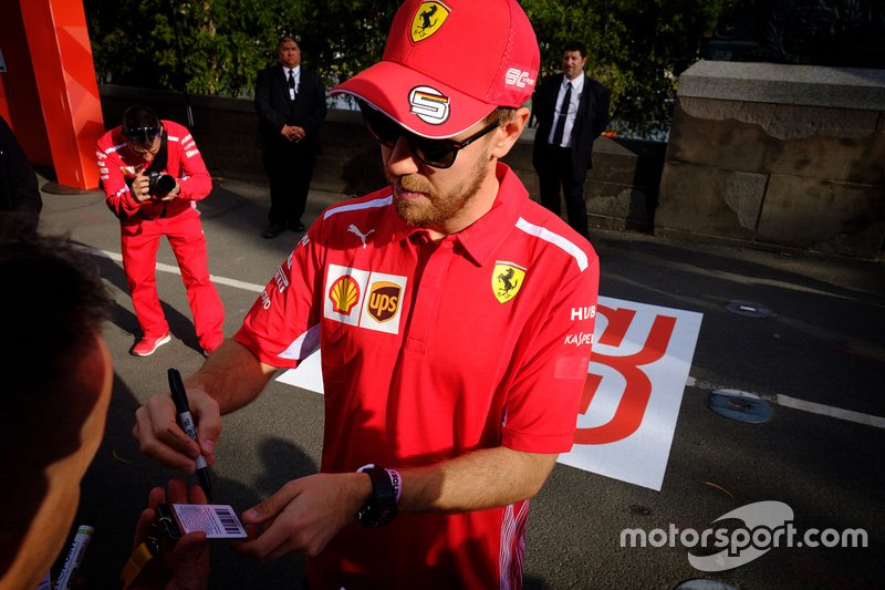Sebastian Vettel, Ferrari signs autographs for the fans