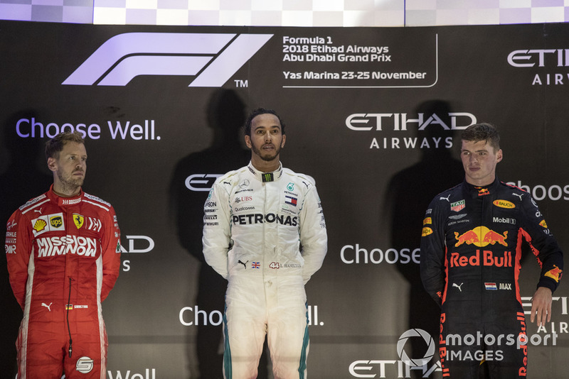 Podio: segundo lugar Sebastian Vettel, Ferrari y tercer lugar Max Verstappen, Red Bull Racing celebran