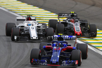 Pierre Gasly, Scuderia Toro Rosso STR13, leads Marcus Ericsson, Sauber C37, and Kevin Magnussen, Haas F1 Team VF-18