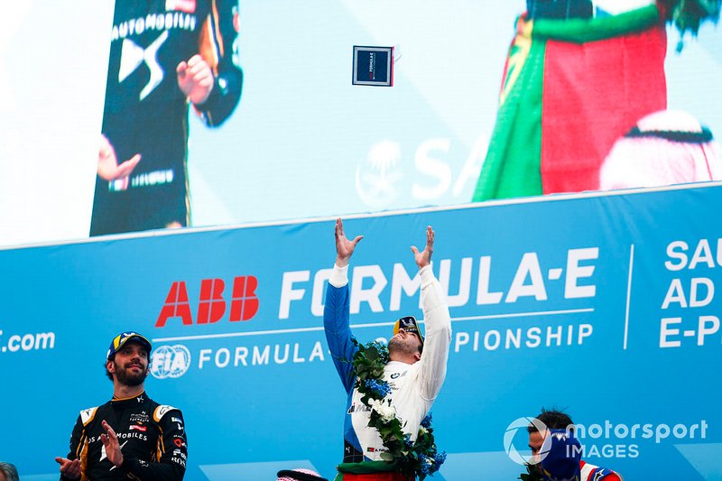Antonio Felix da Costa, BMW I Andretti Motorsports throws his winner's trophy into the air as Jean-Eric Vergne, DS TECHEETAH watches on
