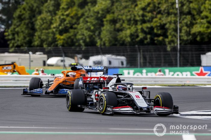 Romain Grosjean, Haas VF-20, Lando Norris, McLaren MCL35