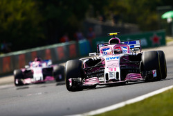 Esteban Ocon, Force India VJM11, leads Sergio Perez, Force India VJM11