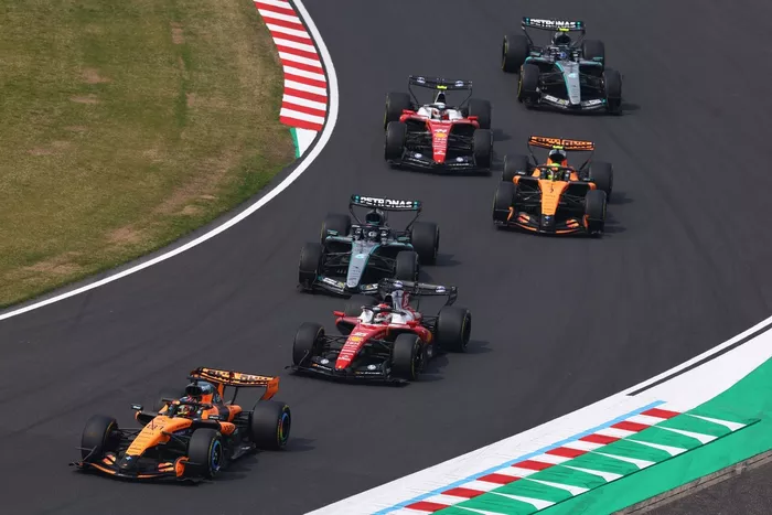 Charles Leclerc, Ferrari; George Russell, Mercedes; Oscar Piastri, McLaren