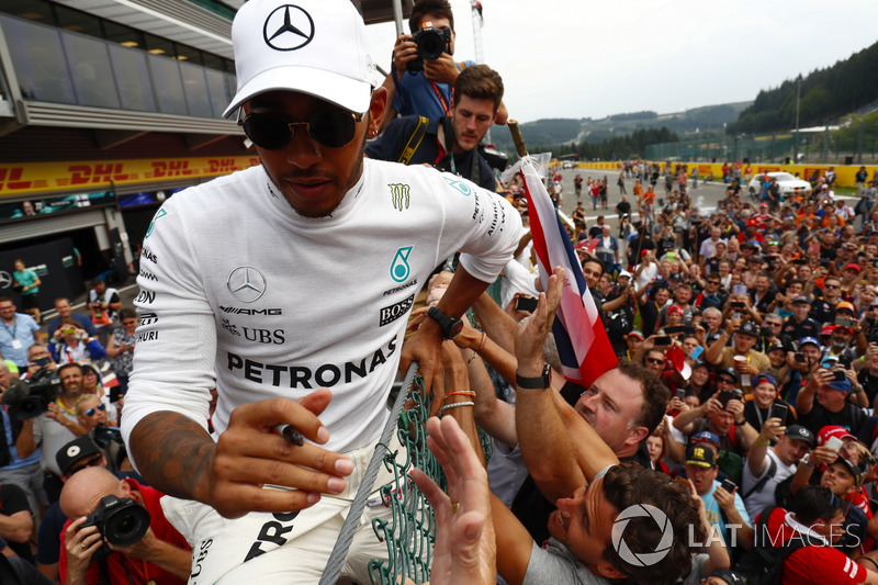Race winner Lewis Hamilton, Mercedes AMG F1, celebrates with fans after the race