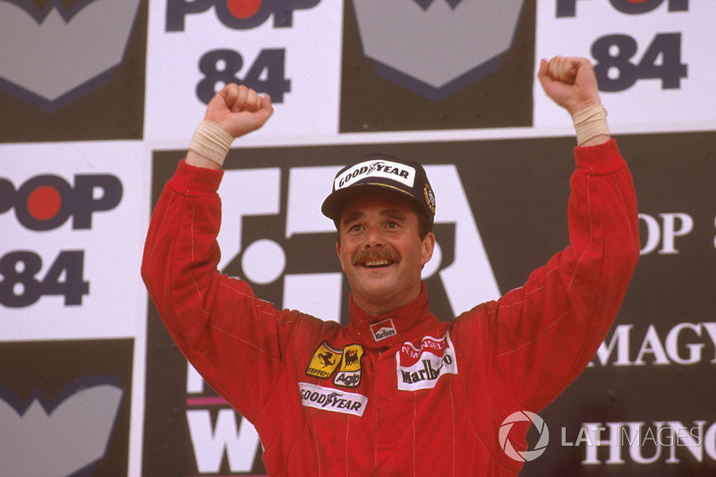 Podium: racewinnaar Nigel Mansell, Ferrari