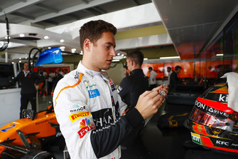 Stoffel Vandoorne, McLaren, adjusts his crash helmet and ear plugs