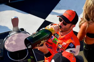 Chase Elliott, Hendrick Motorsports, Chevrolet Camaro SunEnergy1 and Alan Gustafson celebrate with champagne in victory lane 
