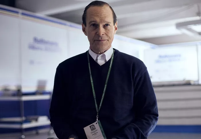 Steven Mackintosh as Frank Williams in Senna