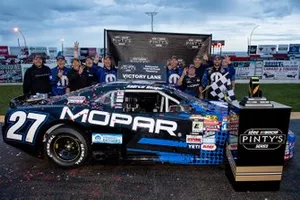 Andrew Ranger celebrates winning the Luxxur 300 at Edmonton International Raceway with his crew Saturday night