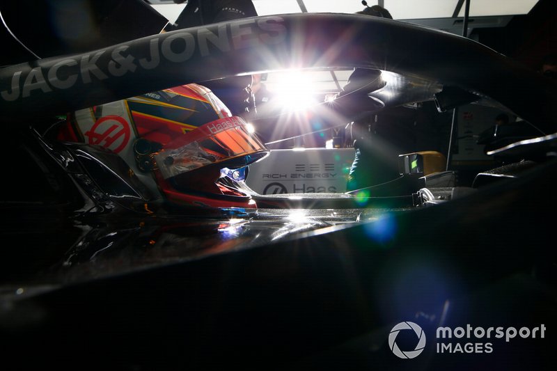 Kevin Magnussen, Haas F1 Team, in cockpit in the team's garage