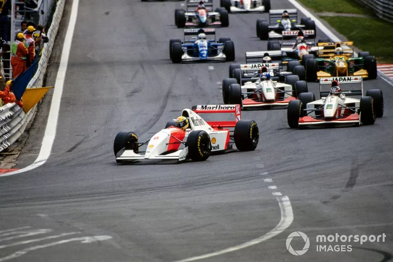 Ayrton Senna, McLaren MP4-8 Ford, leads Aguri Suzuki, Footwork FA14 Mugen-Honda, Derek Warwick, Footwork FA14 Mugen-Honda, and J. J. Lehto, Sauber C12