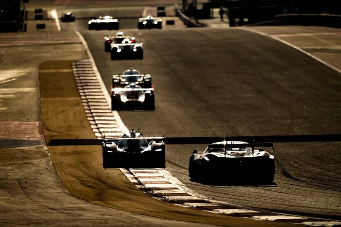 Track action at sunset