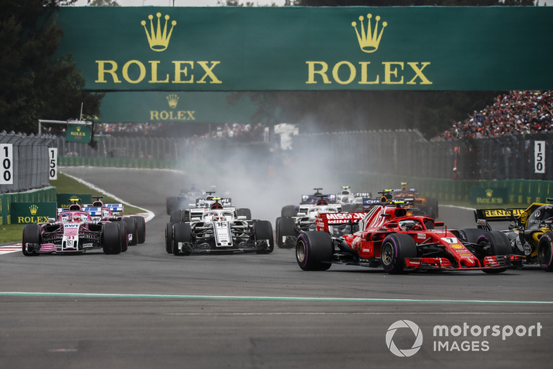 Kimi Raikkonen, Ferrari SF71H, Charles Leclerc, Sauber C37 and Esteban Ocon, Racing Point Force India VJM11 battle