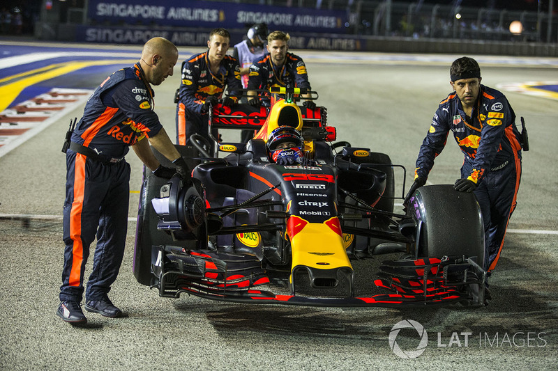 Max Verstappen, Red Bull Racing RB13 is pushed by mechanics