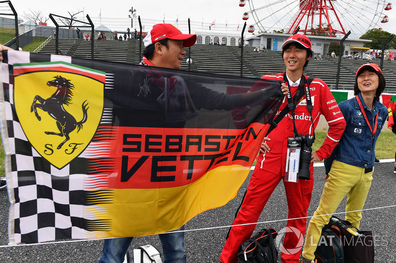 Sebastian Vettel, Ferrari fans and banner