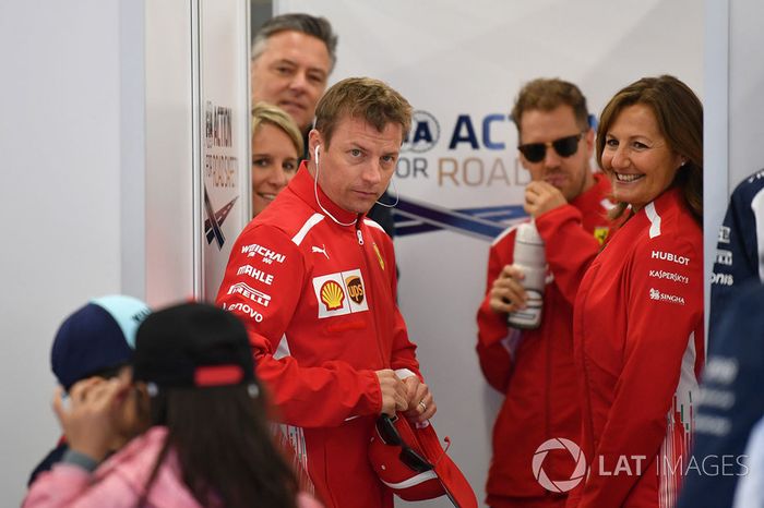 Kimi Raikkonen, Ferrari and grid kids on the drivers parade