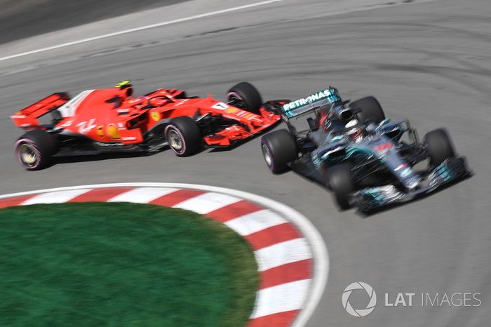 Lewis Hamilton, Mercedes-AMG F1 W09 y Kimi Raikkonen, Ferrari SF71H