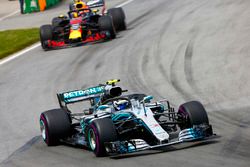 Valtteri Bottas, Mercedes AMG F1 W09, leads Max Verstappen, Red Bull Racing RB14