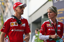 Sebastian Vettel, Ferrari met persdame Britta Roeske