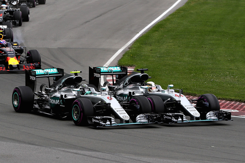 Lewis Hamilton, Mercedes AMG F1 W07 Hybrid and Nico Rosberg, Mercedes AMG F1 W07 Hybrid make contact