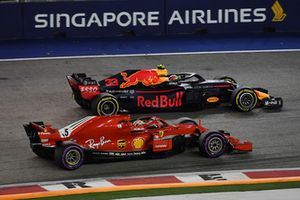 Sebastian Vettel, Ferrari SF71H lotta con Max Verstappen, Red Bull Racing RB14